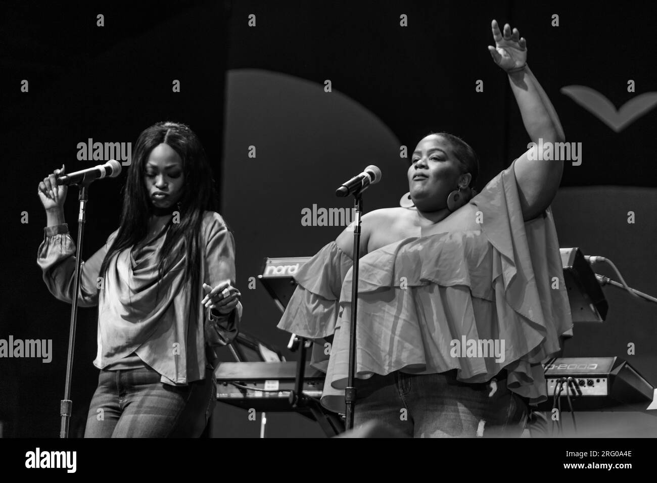 Sara Williams and Camille Grigsby sing for Ledisi on the main stage during the 2021 Monterey