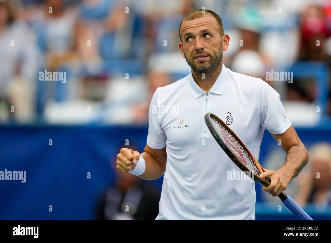 Daniel Evans, of Britain, reacts after a point against Tallon Griekspoor, of the Netherlands, during the mens singles final of the DC Open tennis tournament Sunday, Aug