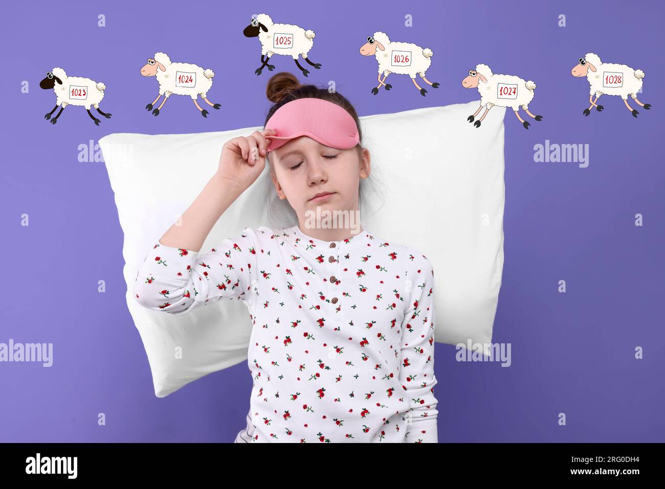 Insomnia. Girl with pillow and blindfold counting to fall asleep on