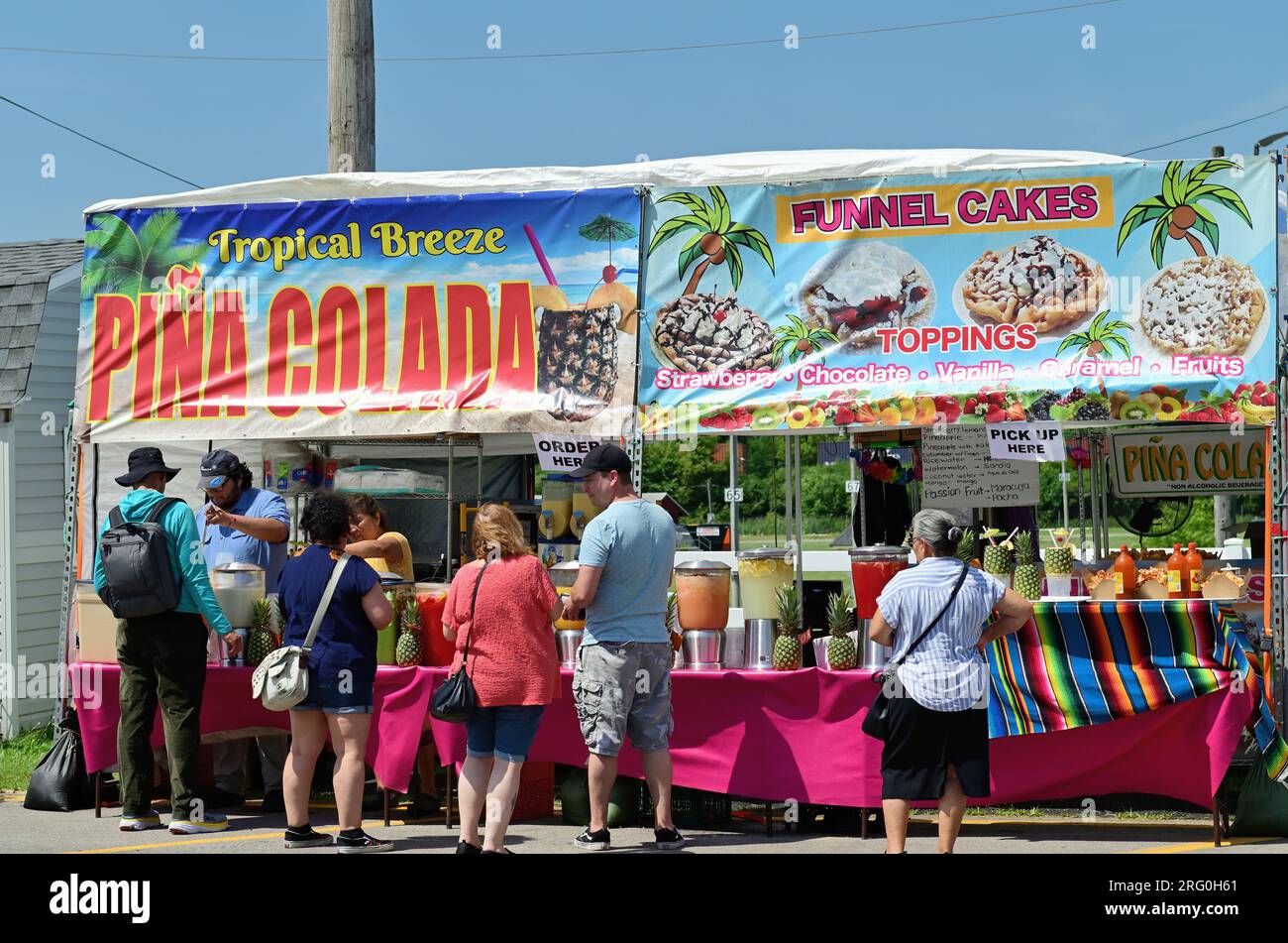 Wheaton, Illinois, USA. Due to near record high temperatures, vendor booths that sold liquid refreshment were popular at the DuPage County Fair. Stock Photo