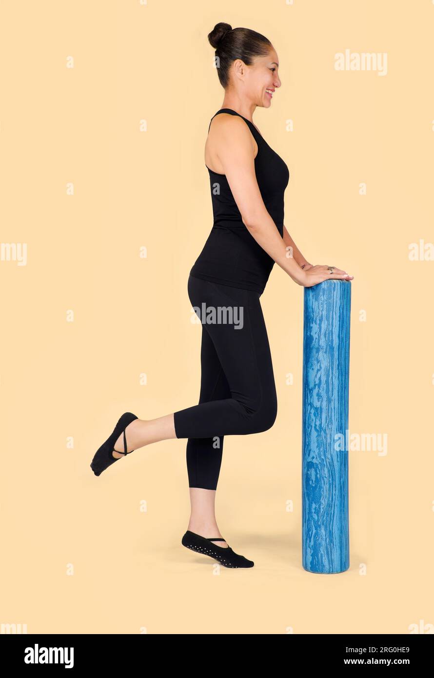 Specialized trauma releasing exercises for elderly people, 55 years old woman trainer posing for