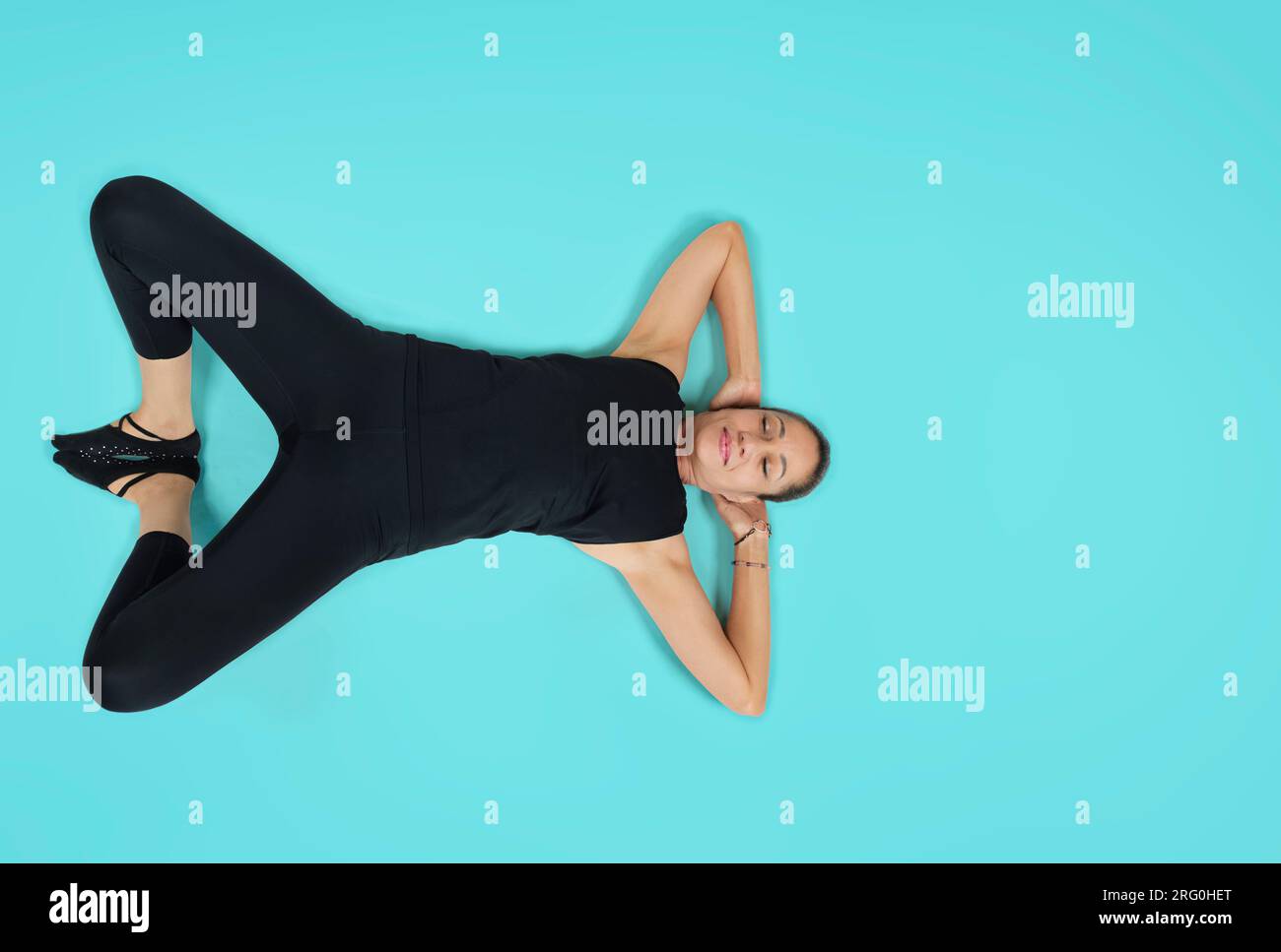 Specialized trauma releasing exercises for elderly people, 55 years old woman trainer posing for