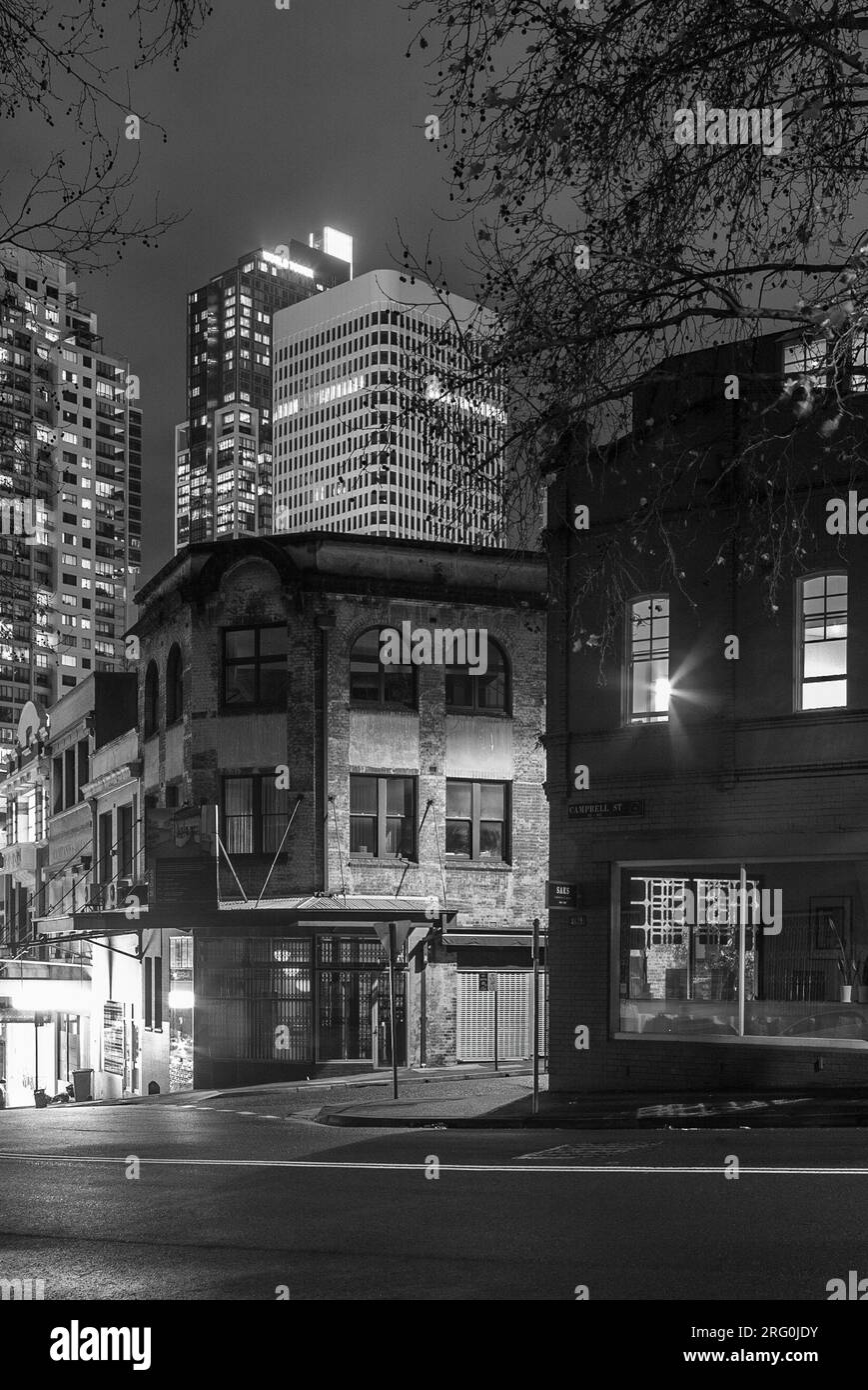 A night view of a storefront on Campbell Street at Foster Street in