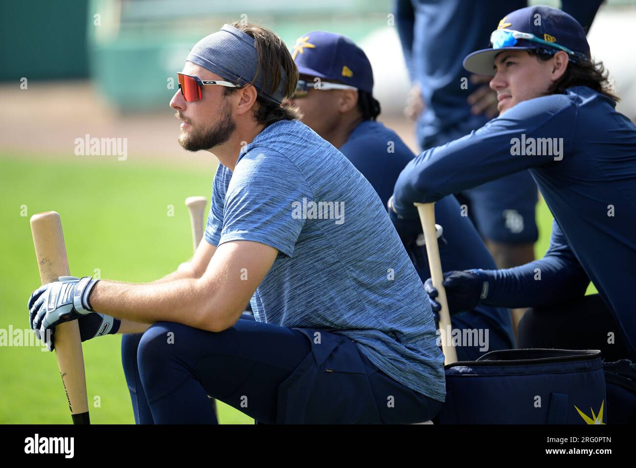 Tampa Bay Rays outfielder Josh Lowe, left, waits to take his turn in
