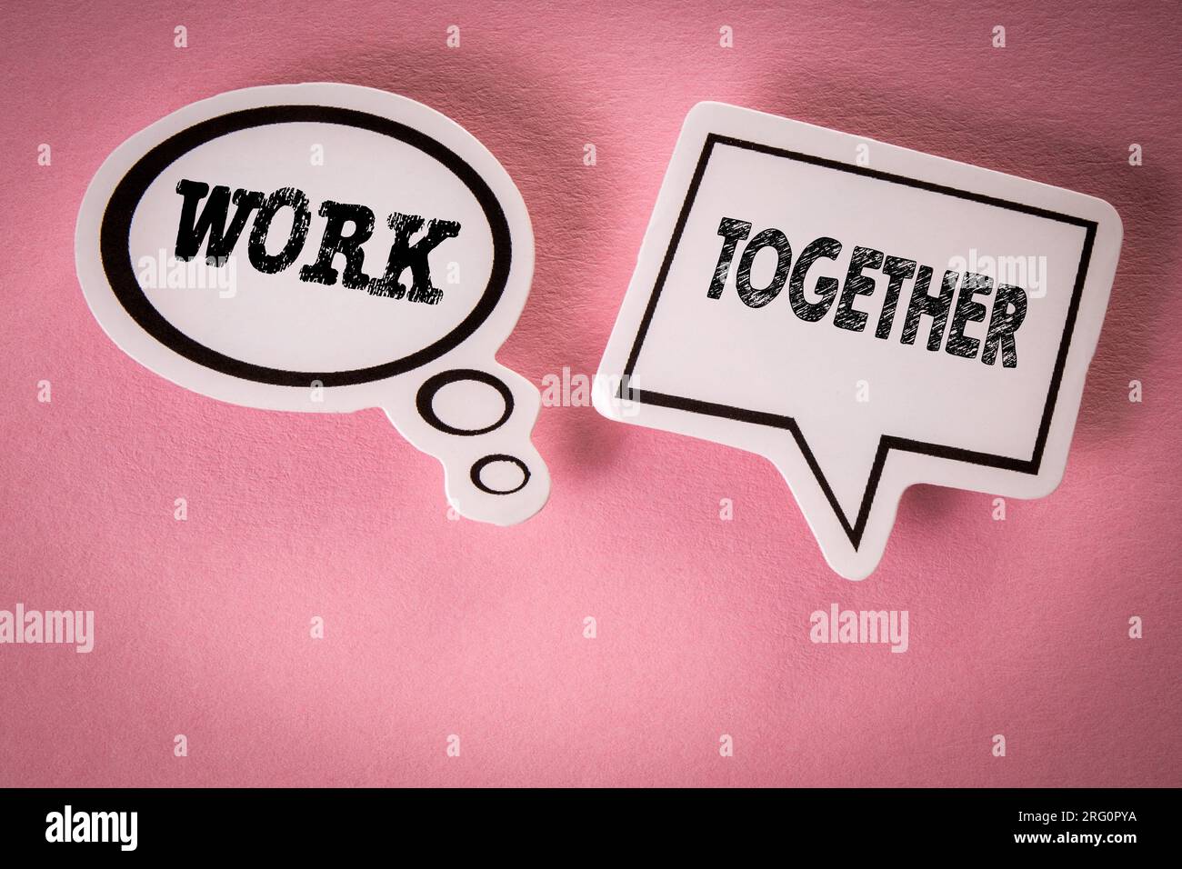 WORK TOGETHER Concept. Two speech bubbles with text on a pink ...