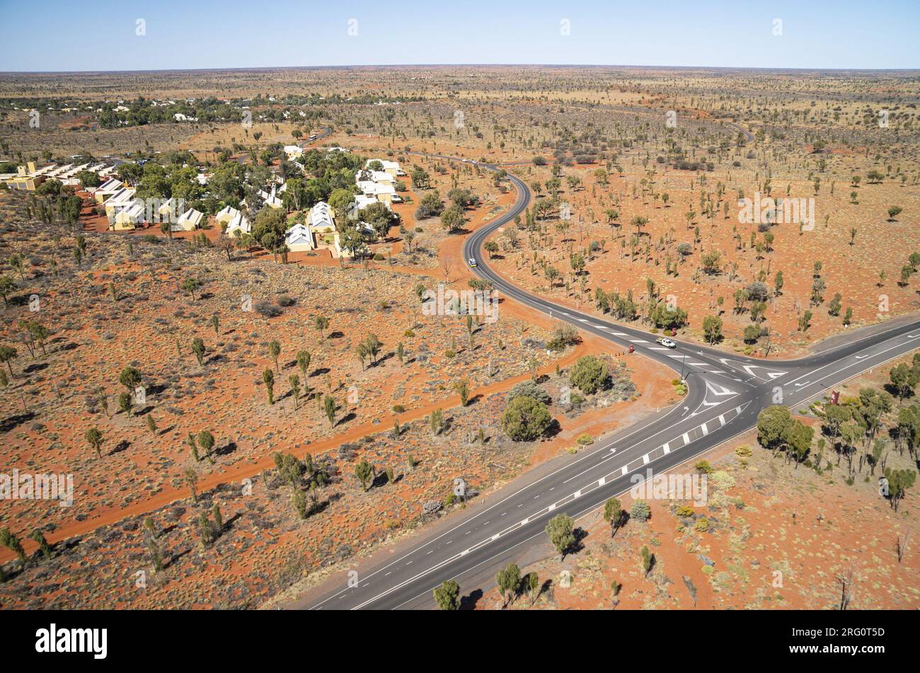 Aerial view of Lasseter Highway junction with Yulara Drive that leads