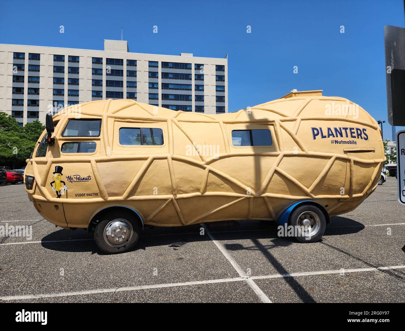 New York City, USA - May 10, 2023: The Peanut Van planters nutmobile of mr peanut advertisement car van, side view. Stock Photo