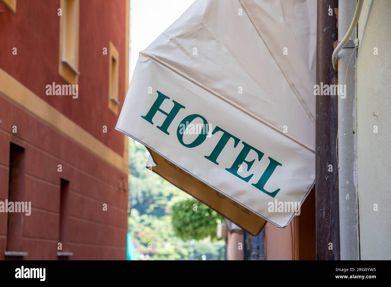 Hotel sign text in wall building facade signage in tourist city Stock ...