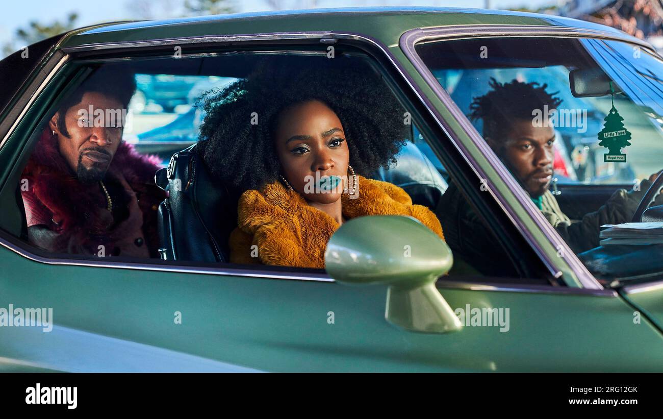 JAMIE FOXX, TEYONAH PARRIS and JOHN BOYEGA in THEY CLONED TYRONE (2023), directed by JUEL TAYLOR. Credit: MACRO / Made With Love Media / Album Stock Photo