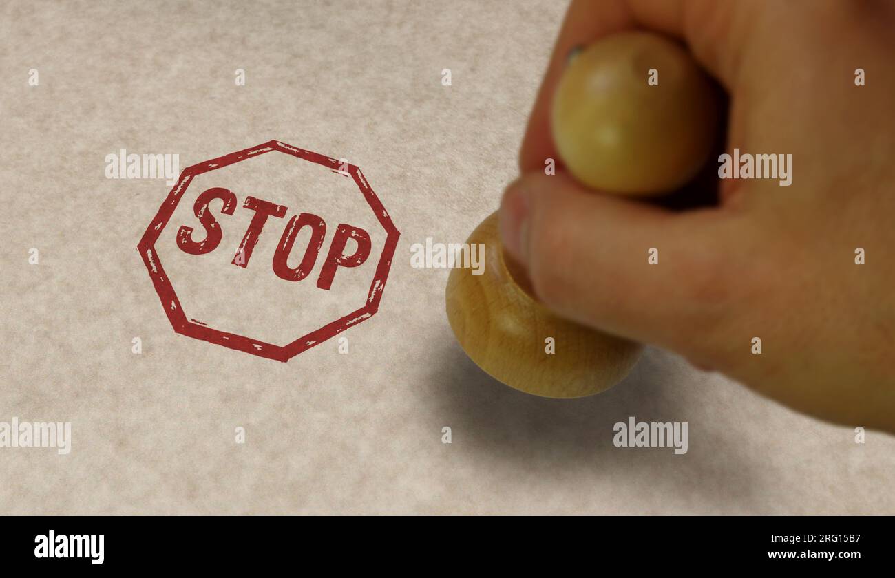 Stop stamp and stamping hand. Blocked and ban concept. Stock Photo