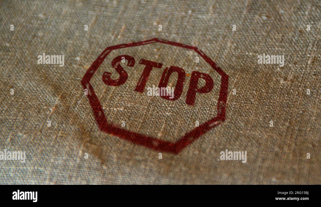 Stop stamp printed on linen sack. Blocked and ban concept. Stock Photo
