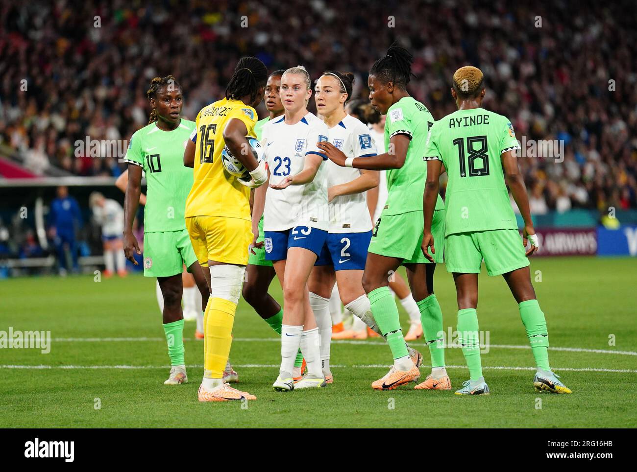 Nigeria goalkeeper Chiamaka Nnadozie is spoken to by England's Alessia Russo as she protests about a penalty decision during the FIFA Women's World Cup, Round of 16 match at Brisbane Stadium, Australia. Picture date: Monday August 7, 2023. Stock Photo