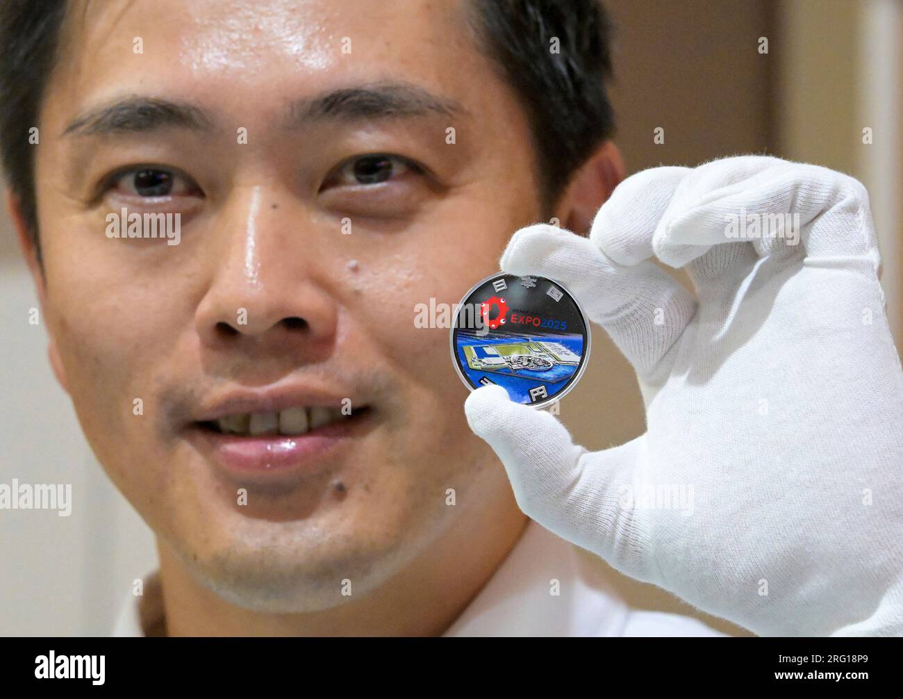 Osaka governor Hirofumi Yoshimura attends a ceremony to start issuing