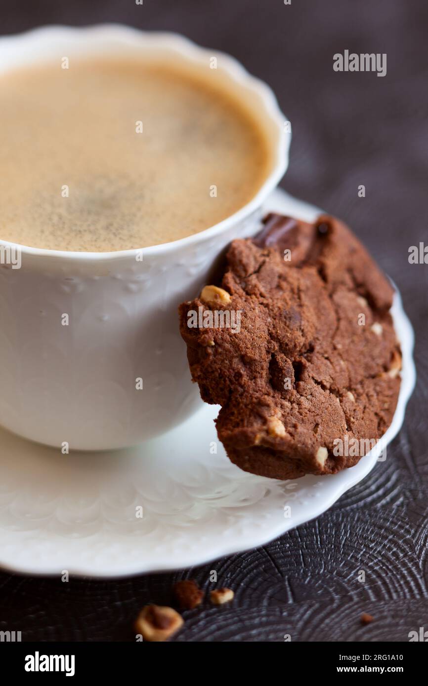 Chocolate and hazelnuts cookies with coffee Stock Photo