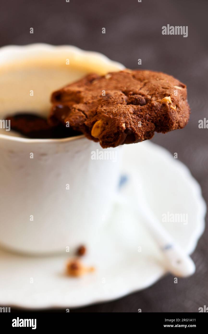 Chocolate and hazelnuts cookies with coffee Stock Photo