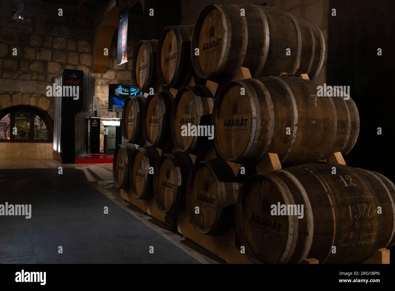 Yerevan, Armenia - May 28 2023: Cellar of the Ararat brandy factory in Yerevan. Barrels of cognac in the cellar. Stock Photo