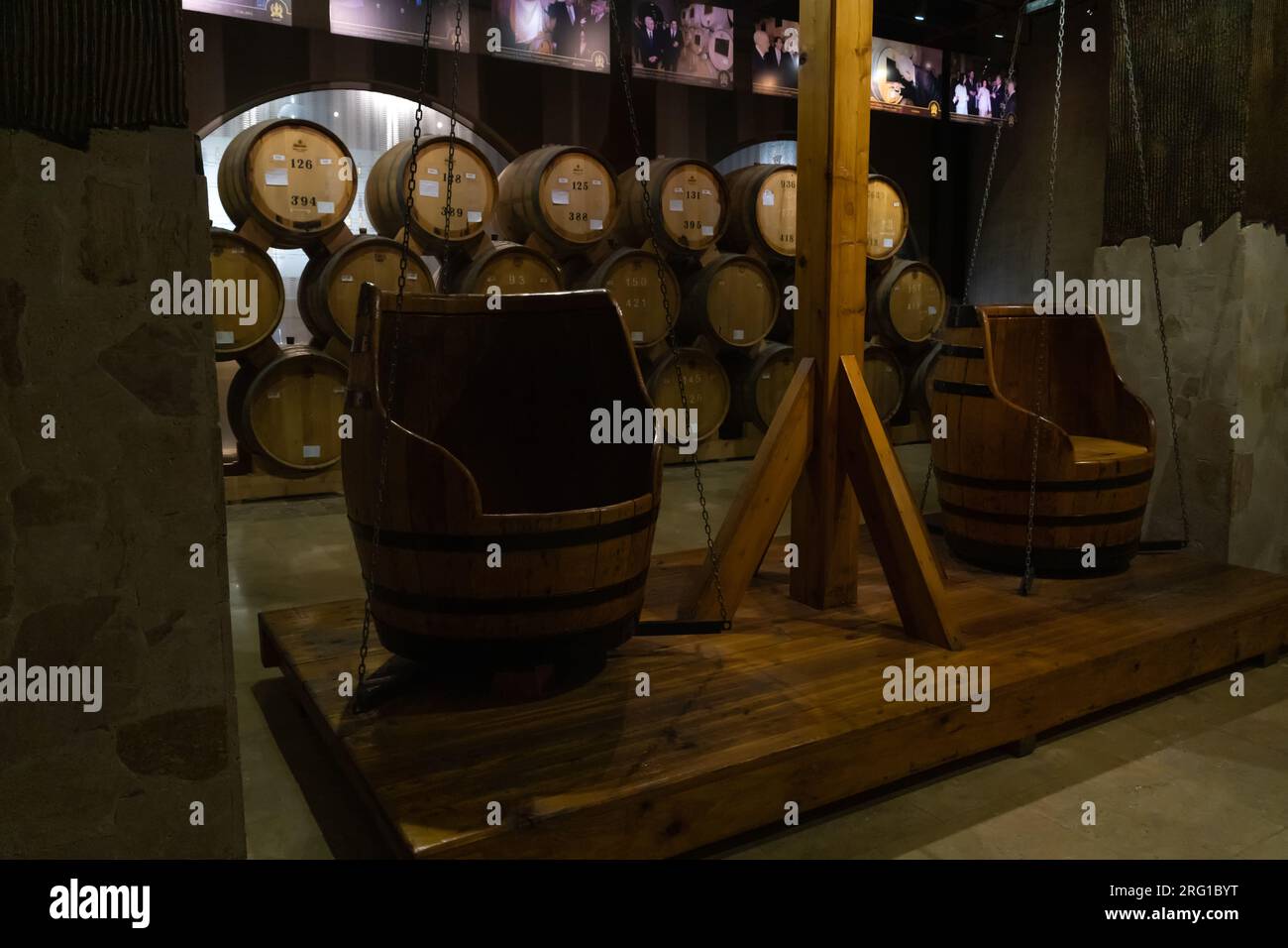 Yerevan, Armenia - May 28 2023: Cellar of the Ararat brandy factory in Yerevan. Barrels of cognac in the cellar. Stock Photo