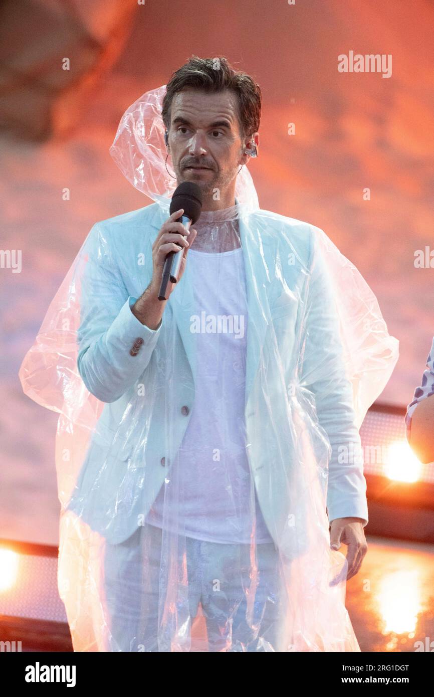 Florian SILBEREISEN, Germany, singer, schlager singer, musician, presenter,  with a rain protection, rain cape, the big Schlager beach party 2023,  recorded on July 15, 2023 in the Amphitheater Gelsenkirchen, broadcast on  August