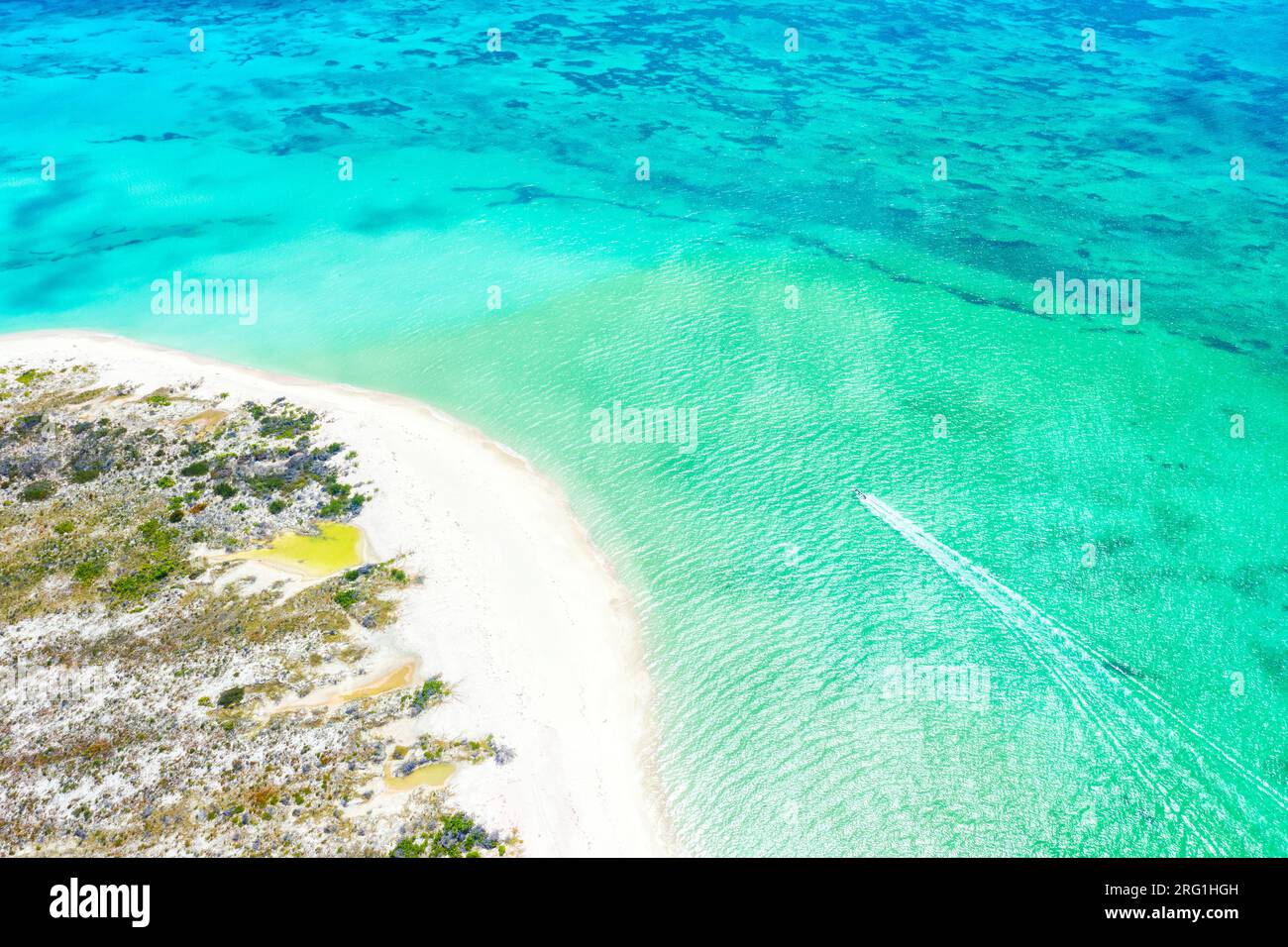 Speedboat in the crystal sea, aerial view, Caribbean Stock Photo