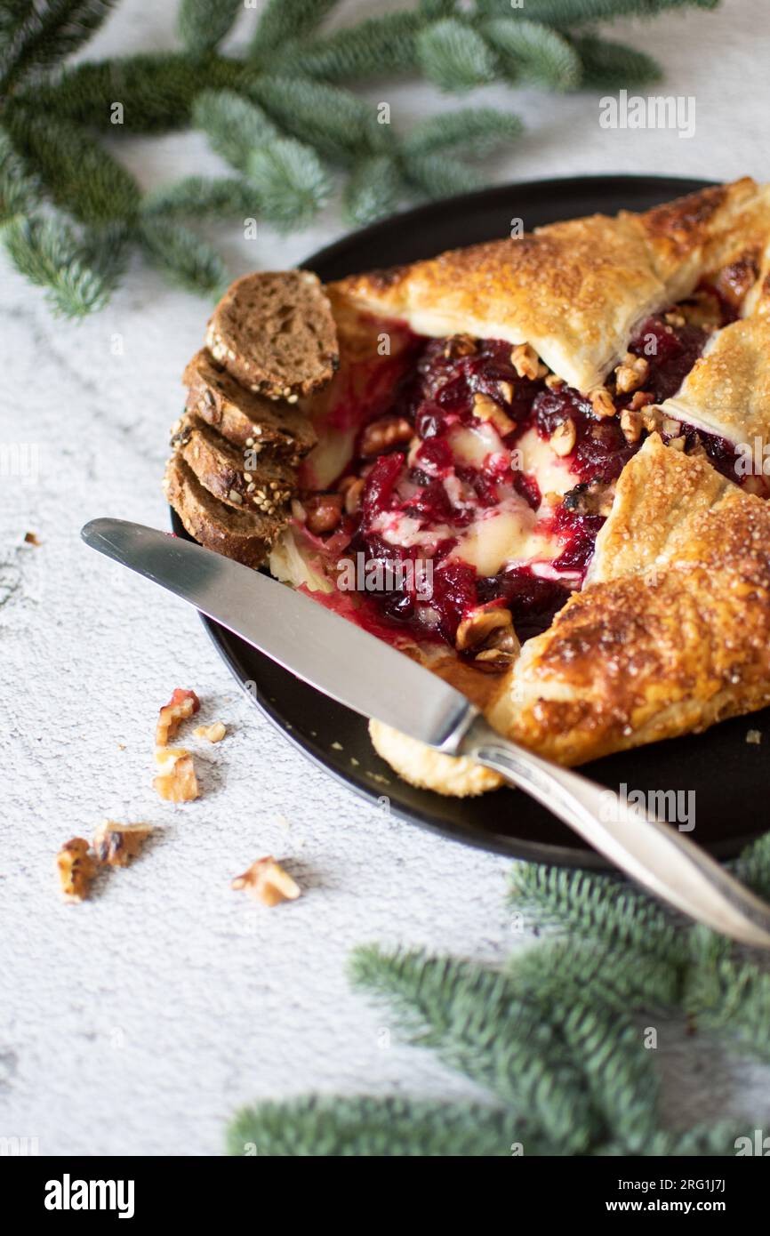 Baked brie cheese and cranberry puff pastry. Homemade puff pastry