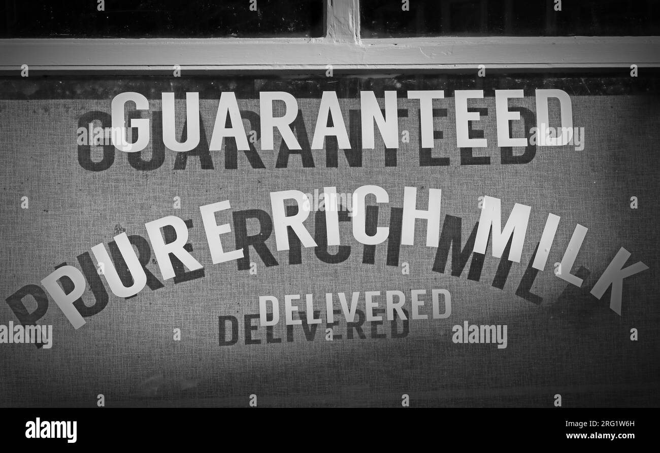 Guaranteed ,Pure Rich milk, delivered from the dairy / bakery, 34 Town Gate, Heptonstall, Hebden Bridge, West Yorkshire, England, UK, HX7 7LW Stock Photo