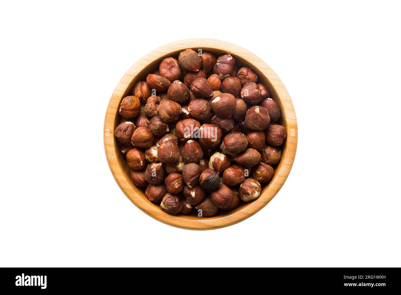 Roasted hazelnut in bowl isolated on white background. hazelnut is