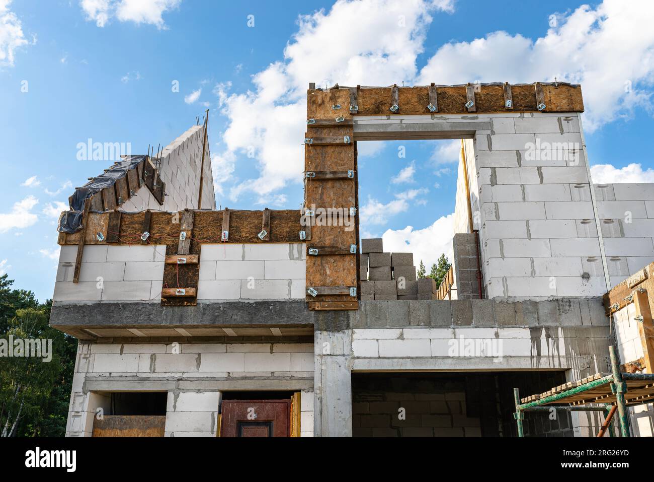 Wooden formwork made of shuttering boards of the gable wall rim and lintels. Stock Photo