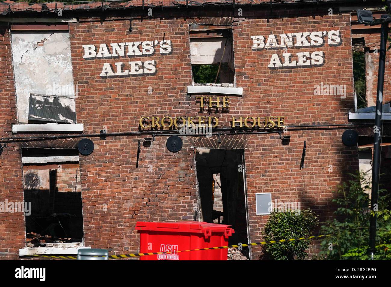 The burnt out remains of The Crooked House pub near Dudley. A fire gutted the 18th century pub just days after it was sold to a private buyer. Firefighters and police were called to the pub in Himley, West Midlands, at 10.45pm on Saturday. The blaze was extinguished and no-one was reported to have been injured, Staffordshire Police said. Picture date: Monday August 7, 2023. Stock Photo