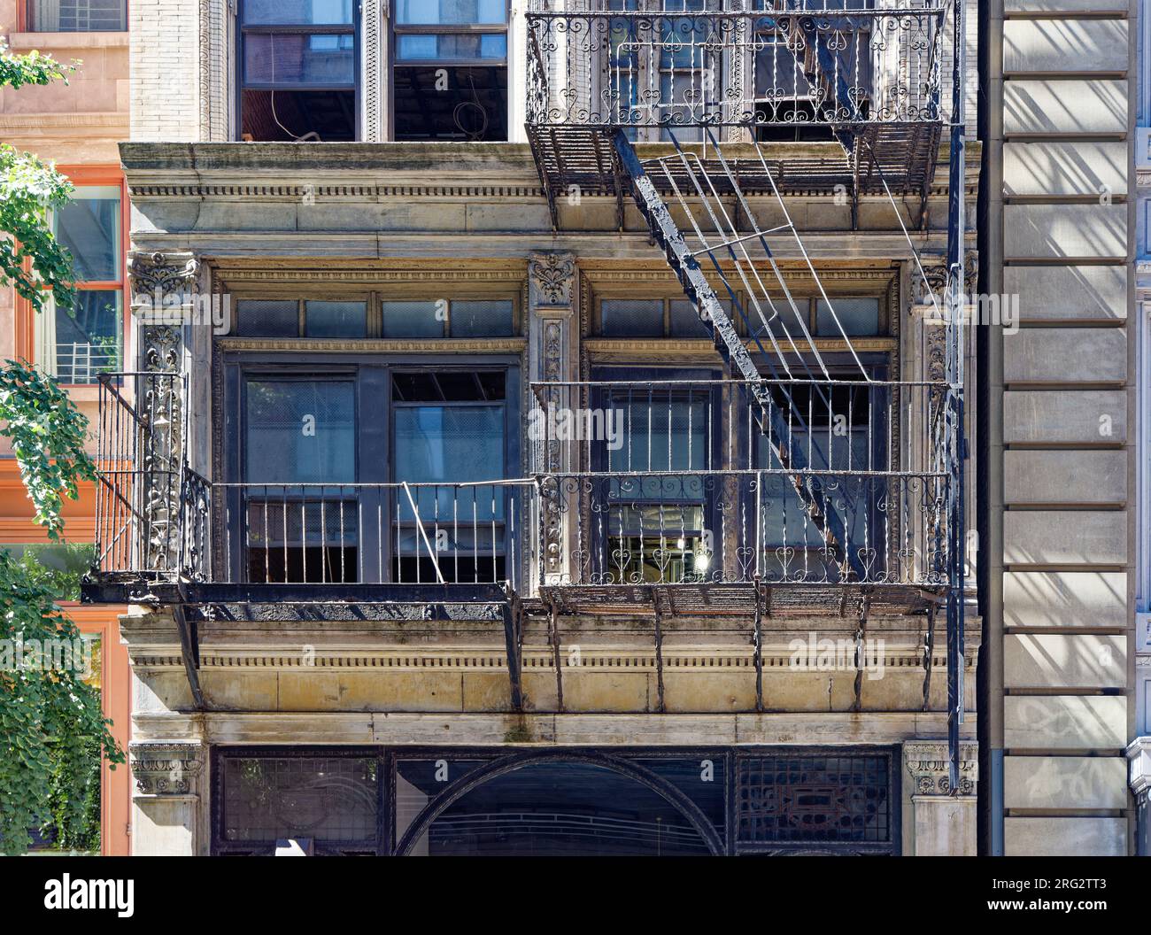 Ladies’ Mile Historic District: 54 W 22nd St. is an 1897 Beaux Arts commercial building converted to apartments, above a store. Stock Photo