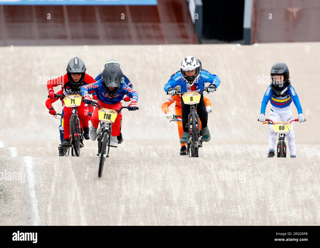 USA's Caleb Gassaway (second left) leads in heat 7 of the BMX Racing