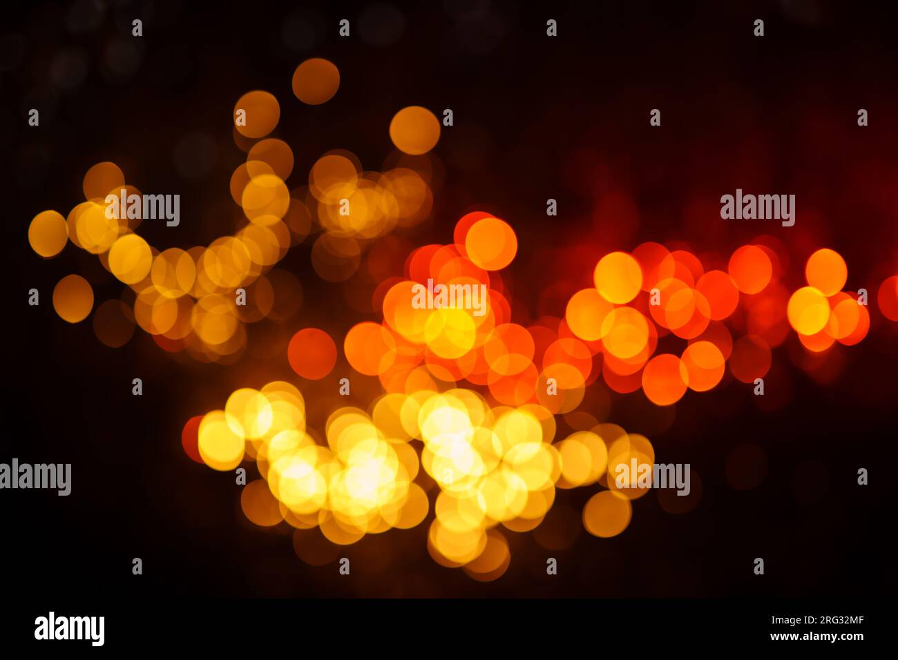 Abstract dark background with defocused lights Stock Photo