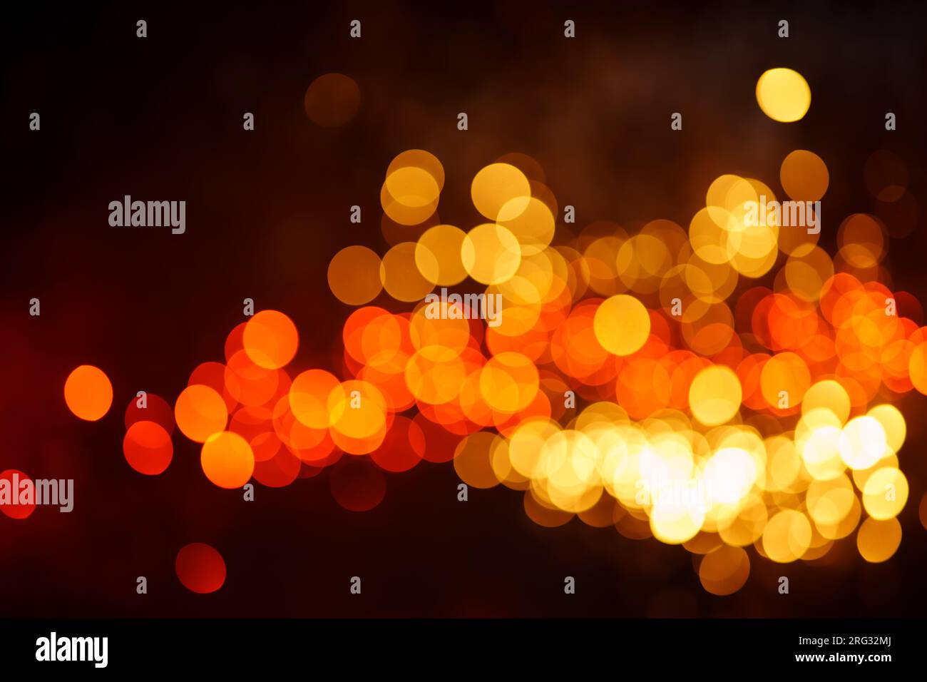Abstract dark background with defocused lights Stock Photo