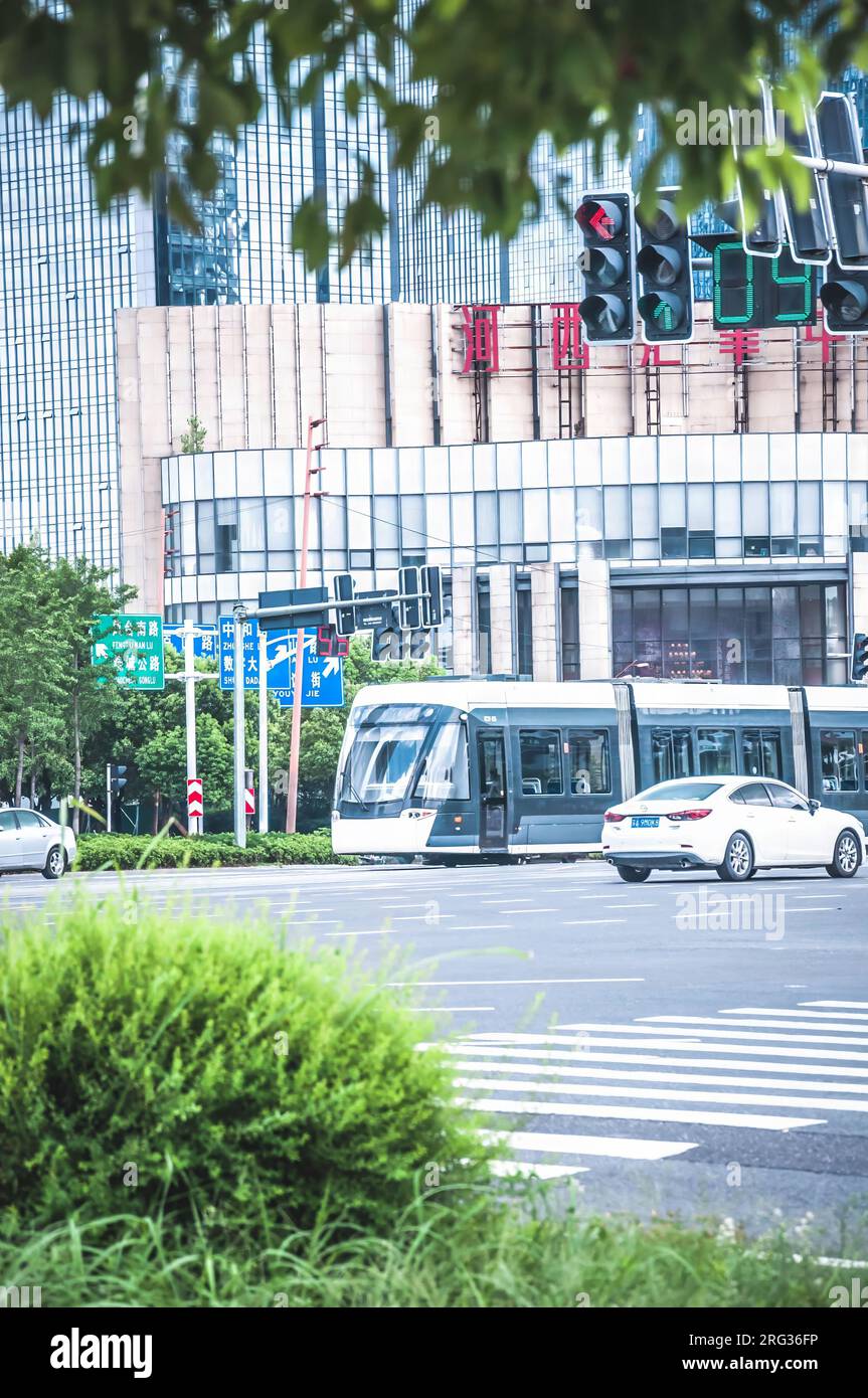 Chinese streets, transportation, tram and station Stock Photo Alamy