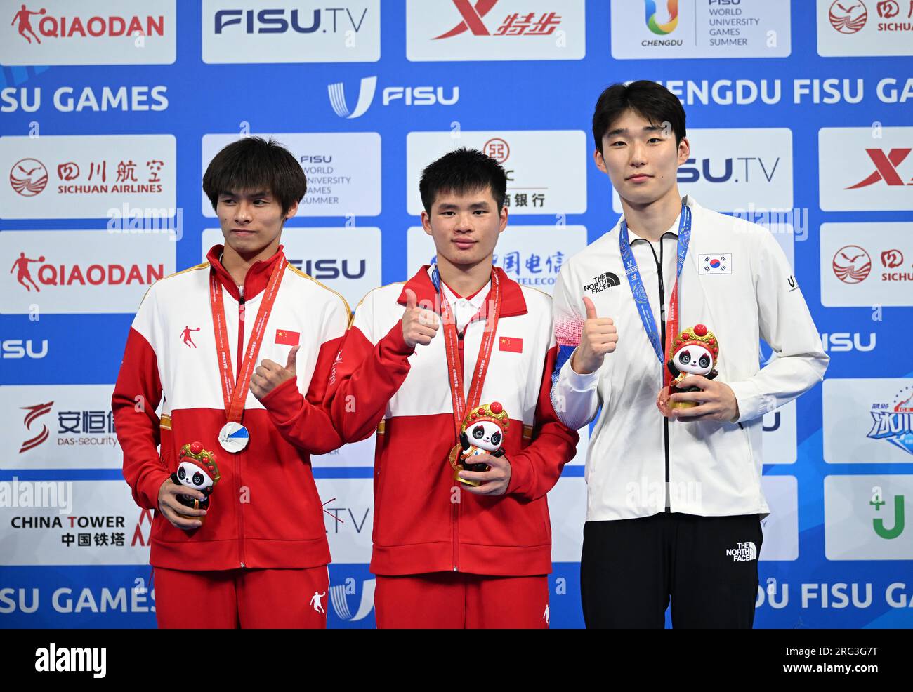 Chengdu, China's Sichuan Province. 7th Aug, 2023. Gold medalist Huang Zigan (C) of China, silver medalist Yang Ling (L) of China and bronze medalist Shin Jungwhi of South Korea pose at the awarding ceremony for men's 10m platform of diving at the 31st FISU Summer World University Games in Chengdu, southwest China's Sichuan Province, Aug. 7, 2023. Credit: Liu Kun/Xinhua/Alamy Live News Stock Photo