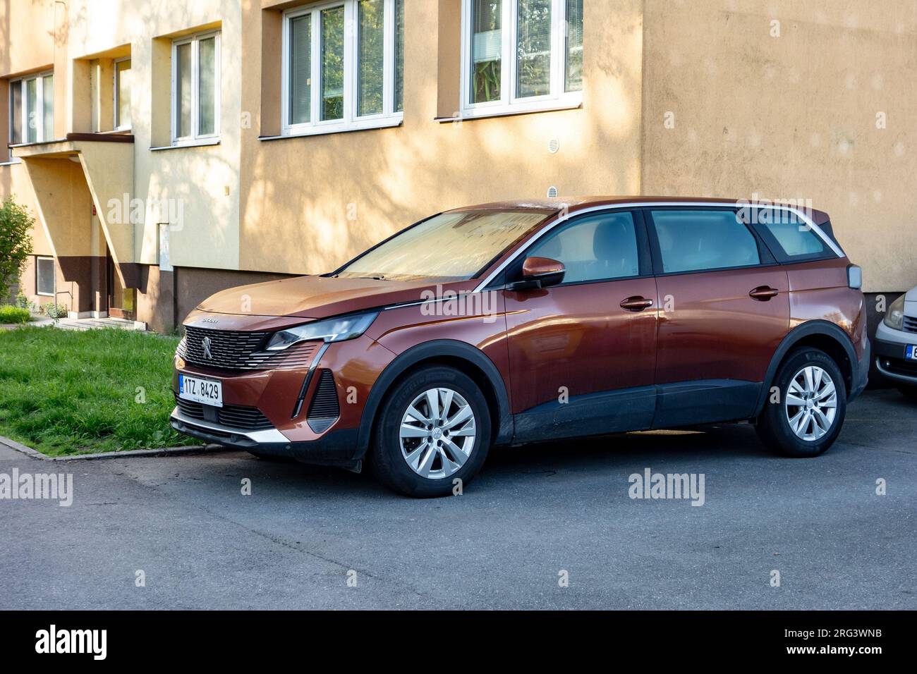 OSTRAVA, CZECH REPUBLIC - MAY 4, 2023: Brand new Peugeot 5008 SUV in brown bronze colour Stock Photo