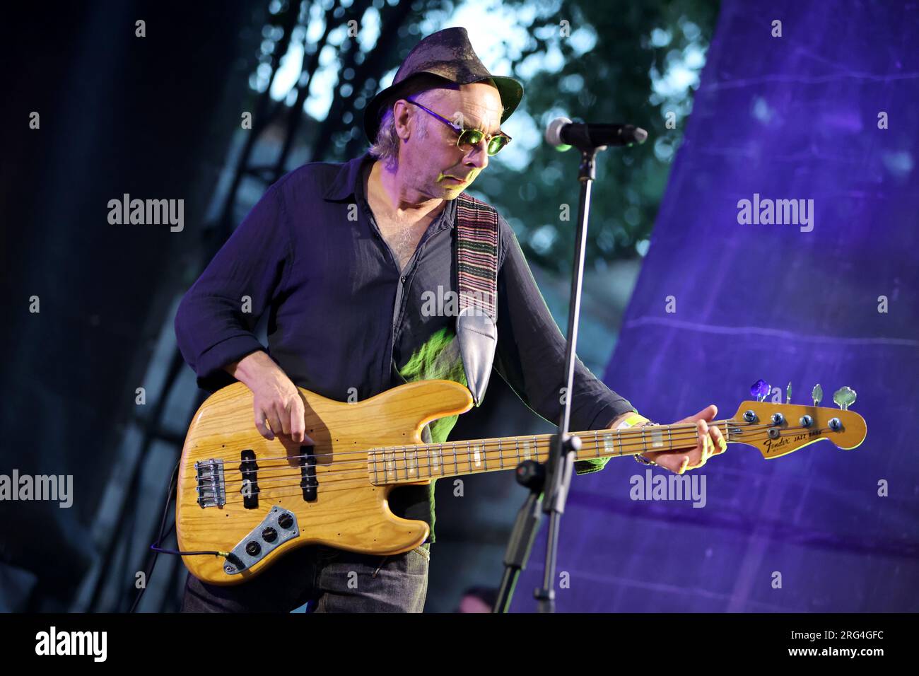 IVANO-FRANKIVSK, UKRAINE - AUGUST 5, 2023 - Ihor Melnychuk of the Braty Hadiukiny rock band plays the guitar during a charity concert in support of th Stock Photo