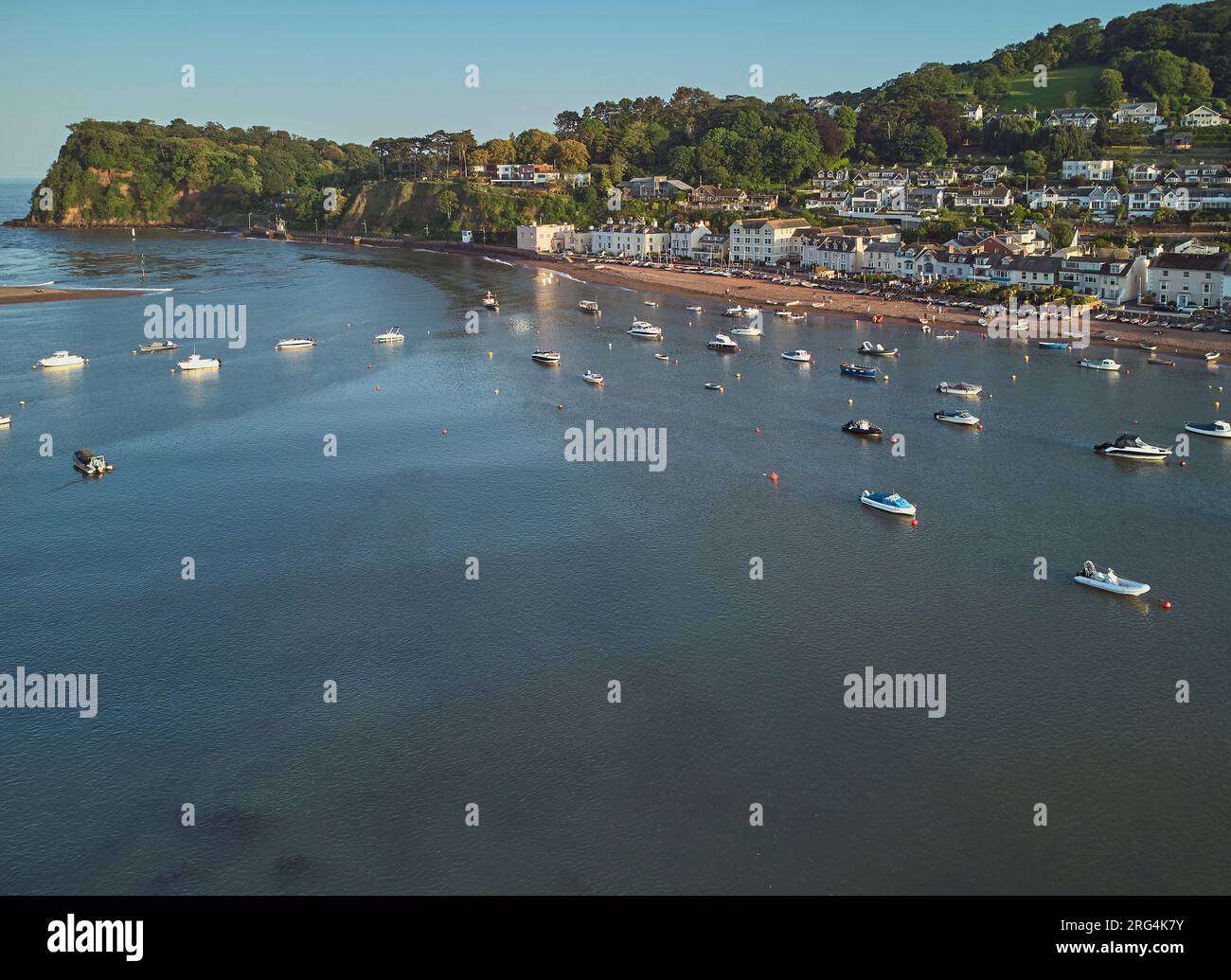 An aerial view of harbour in the estuary of the River Teign, looking towards Shaldon, the Ness