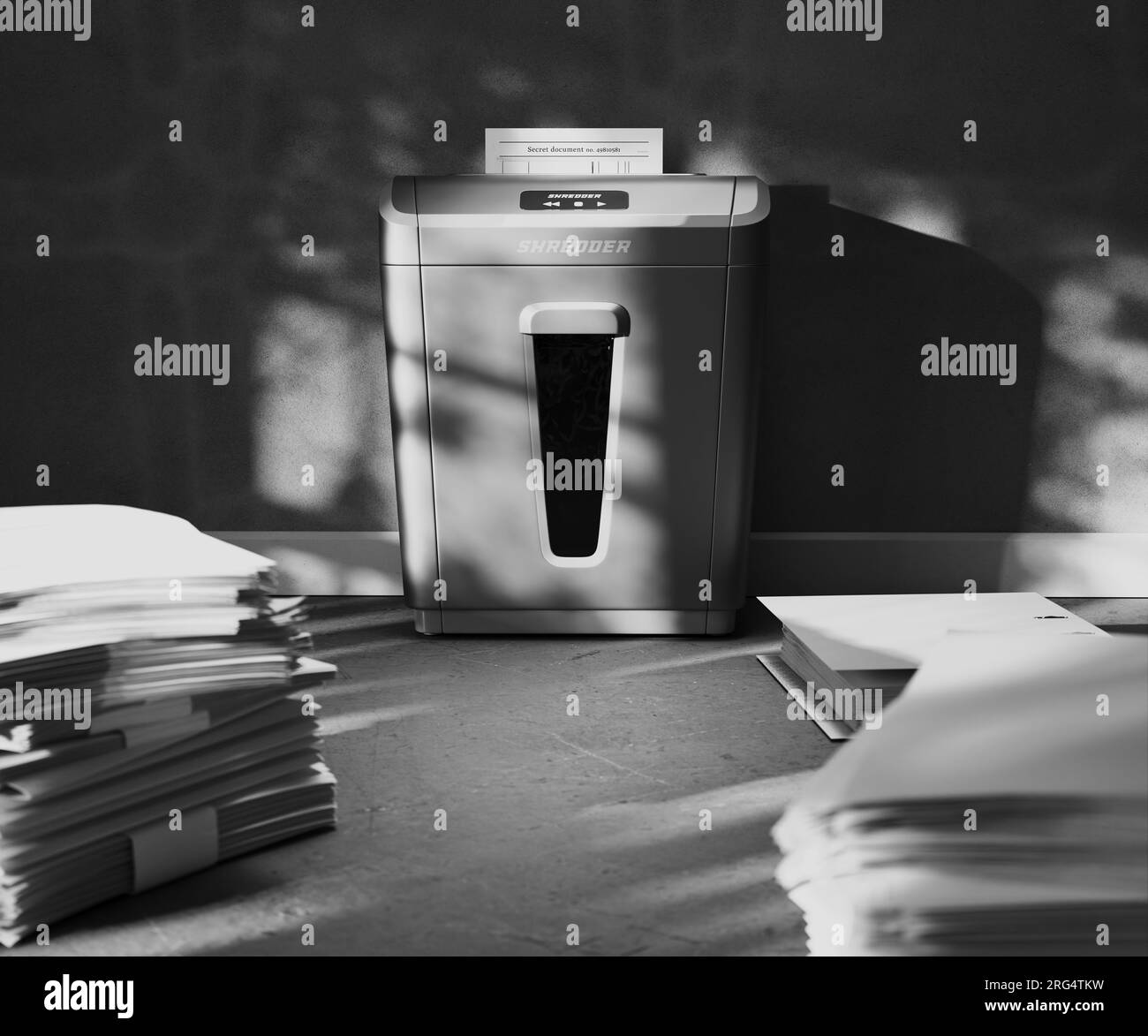 Shredder machine for documents and stacks of paper in daylight room. Office Stock Photo