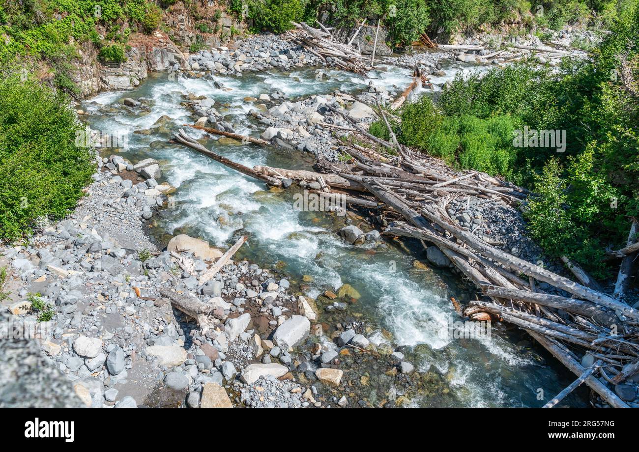 Pontyglasier Rivers A river from a glacier flows under a highway in Mount Rainier National ...