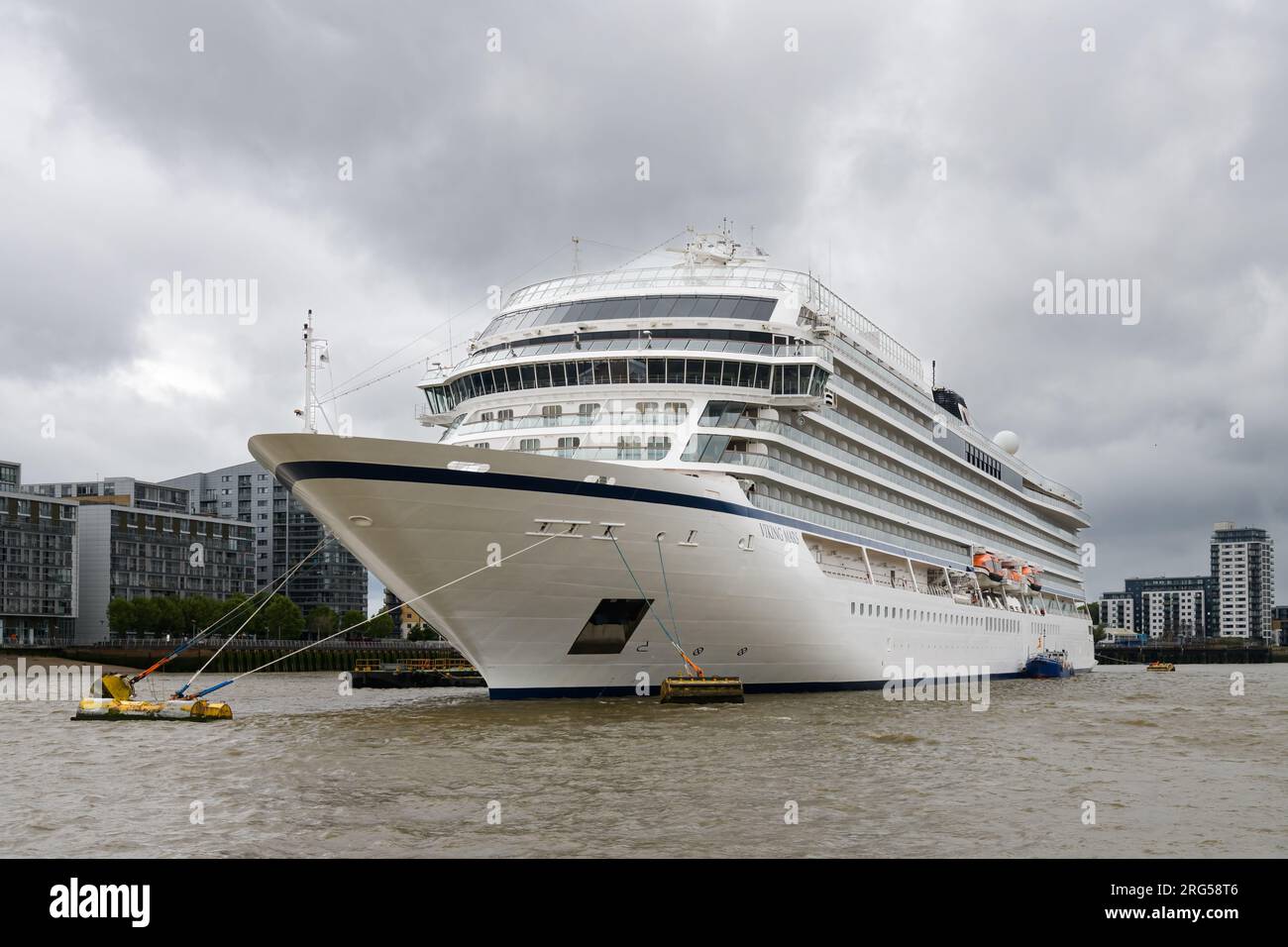 London, UK - July 29, 2023; Viking Mars cruise ship moored under stormy sky on River Thames in London Stock Photo