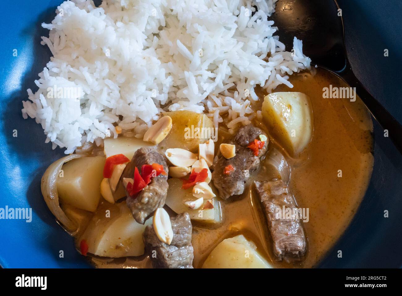 Beef massaman curry made with slow cooked beef, spices and potatoes