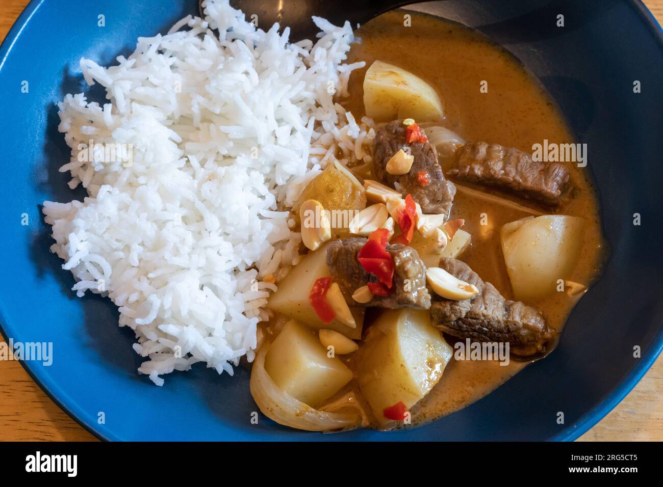 Beef massaman curry made with slow cooked beef, spices and potatoes