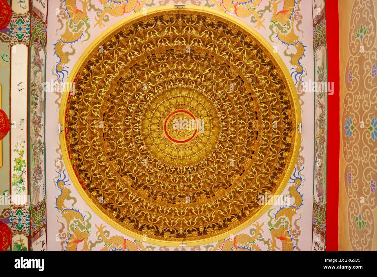 Stunning Chinese Dragon Wood Carving on the Ceiling of a Chinese Buddhist Temple Stock Photo