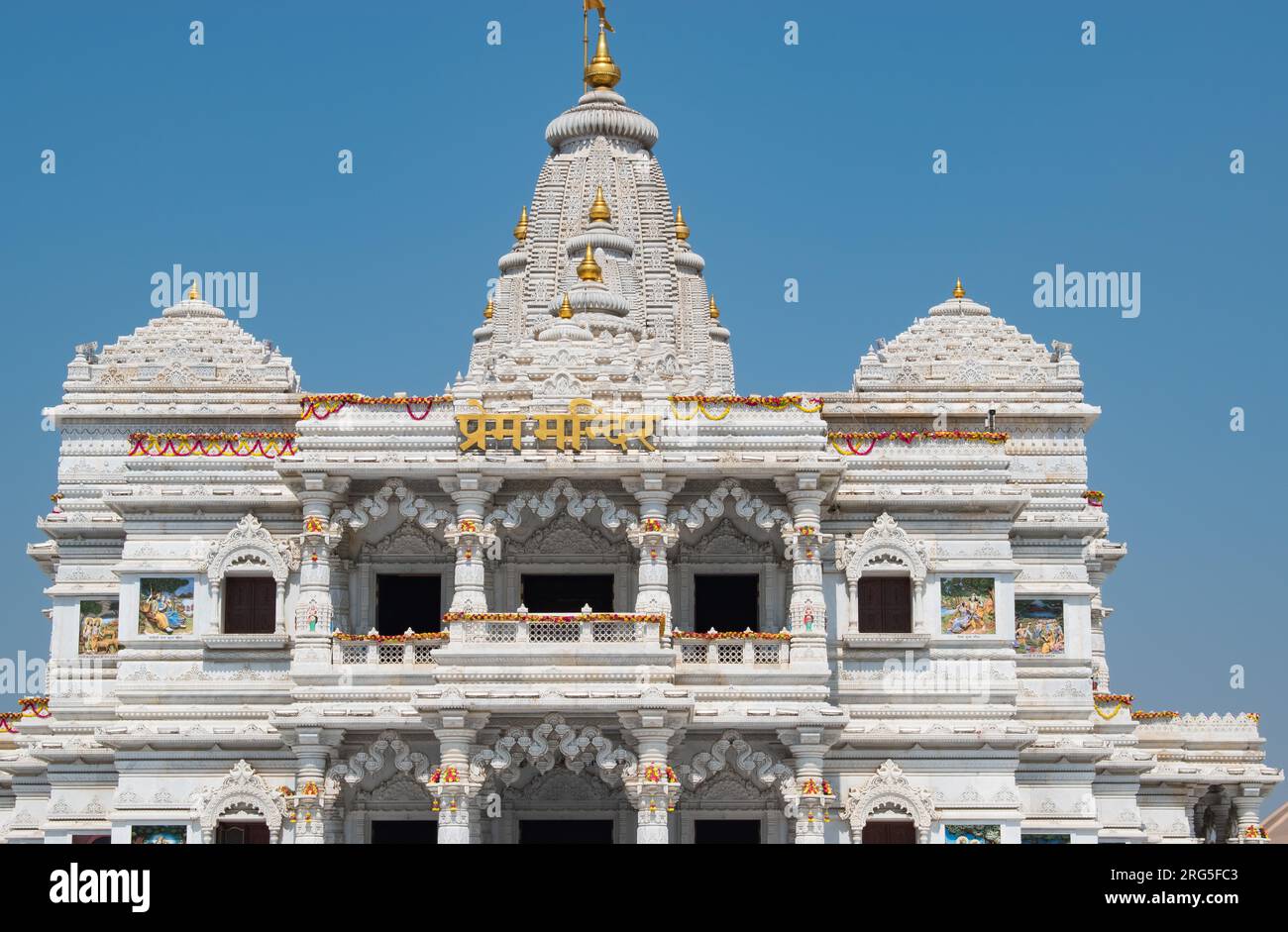 Mathura Vrindavan temple, Prem mandir with blue sky in the background , beautiful architecture. Radha Krishna temple. Stock Photo