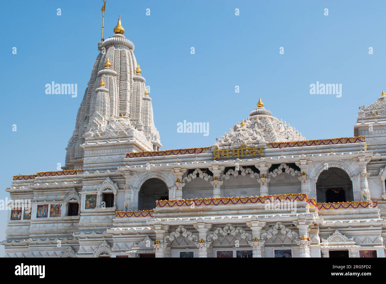 Mathura Vrindavan temple, Prem mandir with blue sky in the background , beautiful architecture. Radha Krishna temple. Stock Photo