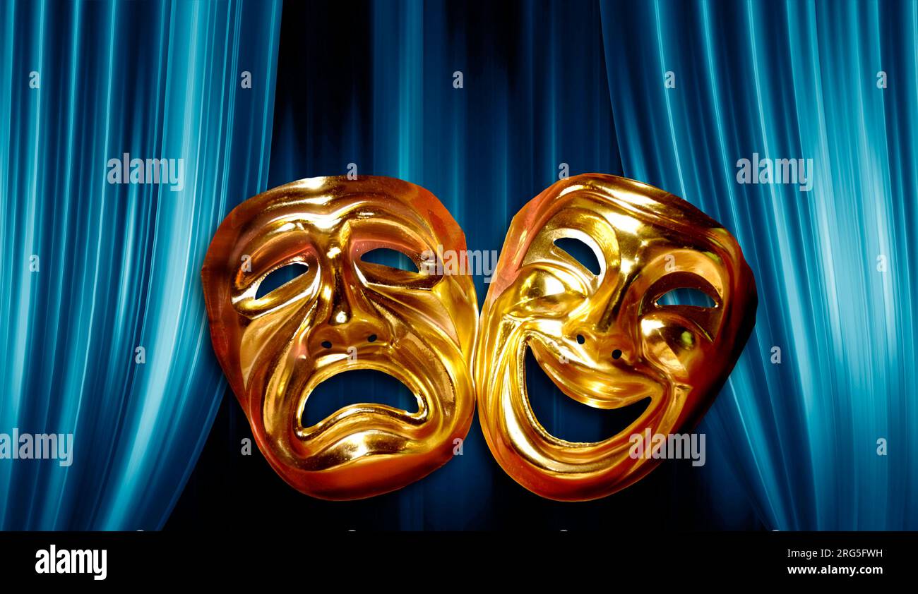 golden masks of tragedy and comedy with a blue curtain behind Stock Photo