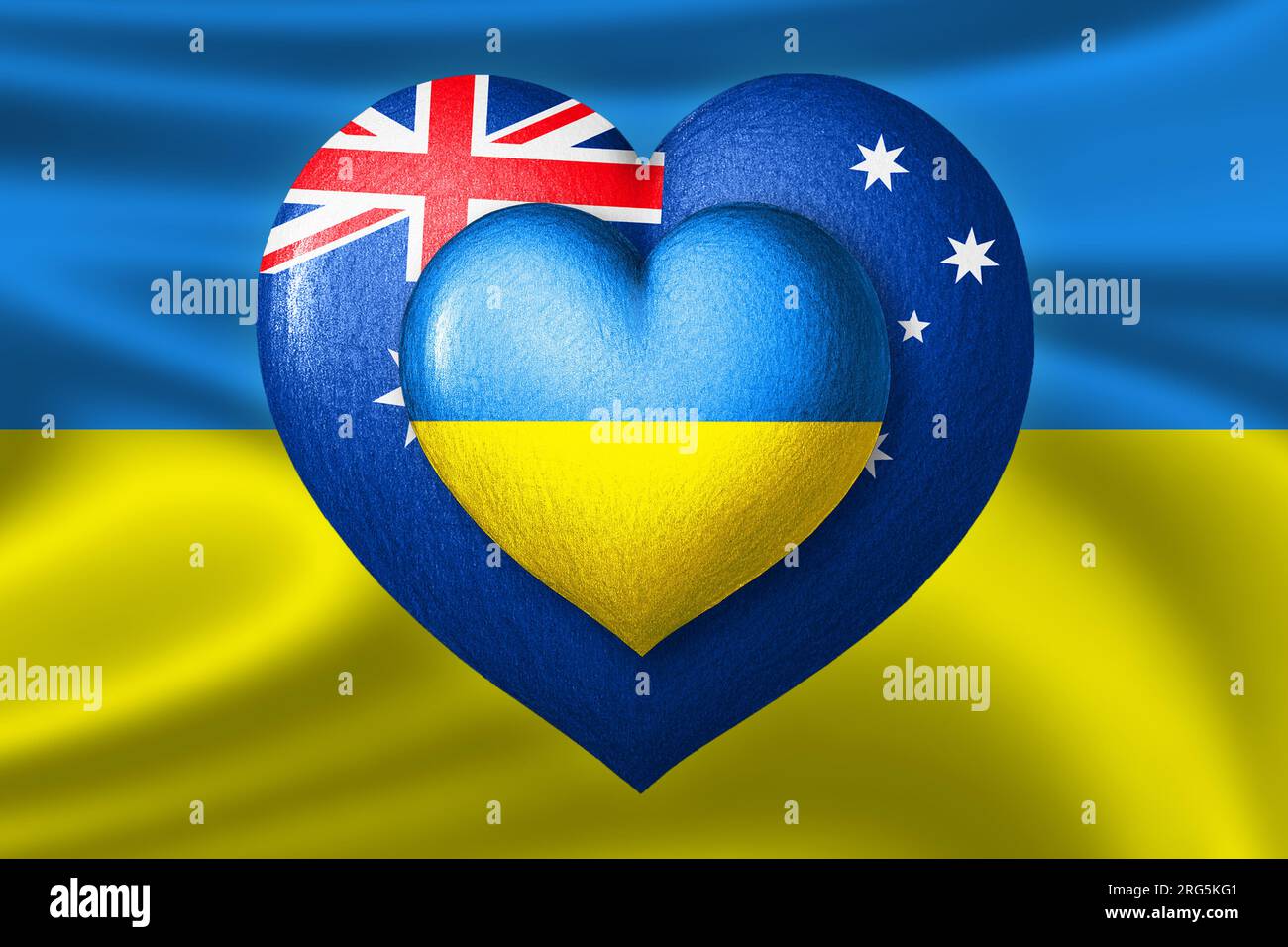 Flags of Ukraine and Australia. Two hearts in the colors of the flags on the background of the flag of Ukraine. Protection, solidarity and help concep Stock Photo