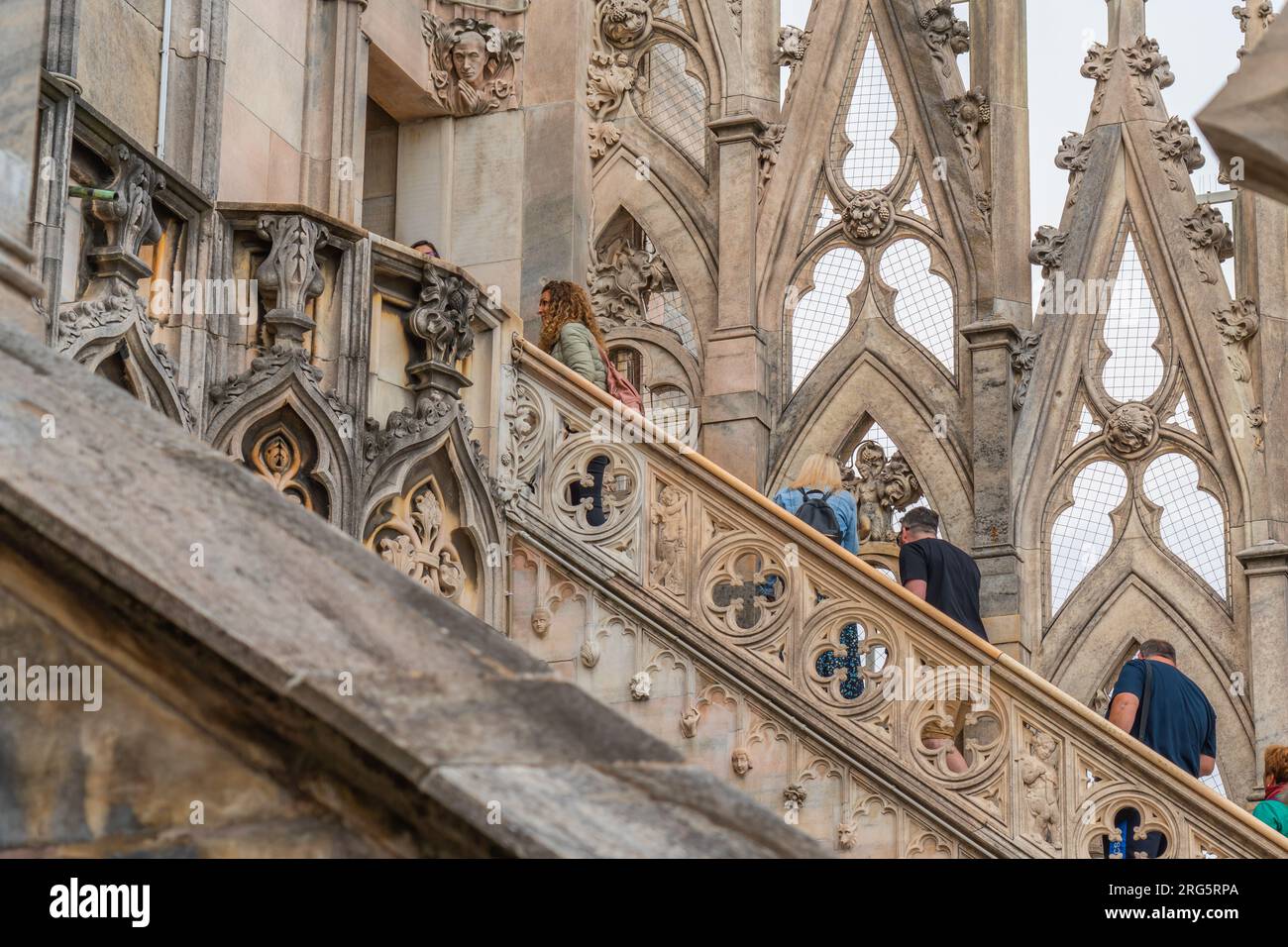 Milan, Italy - May 21. 2023: Cathedral close-up, Milan, Italy. Detail of the facade, exterior with many marble statues, reliefs. Stock Photo