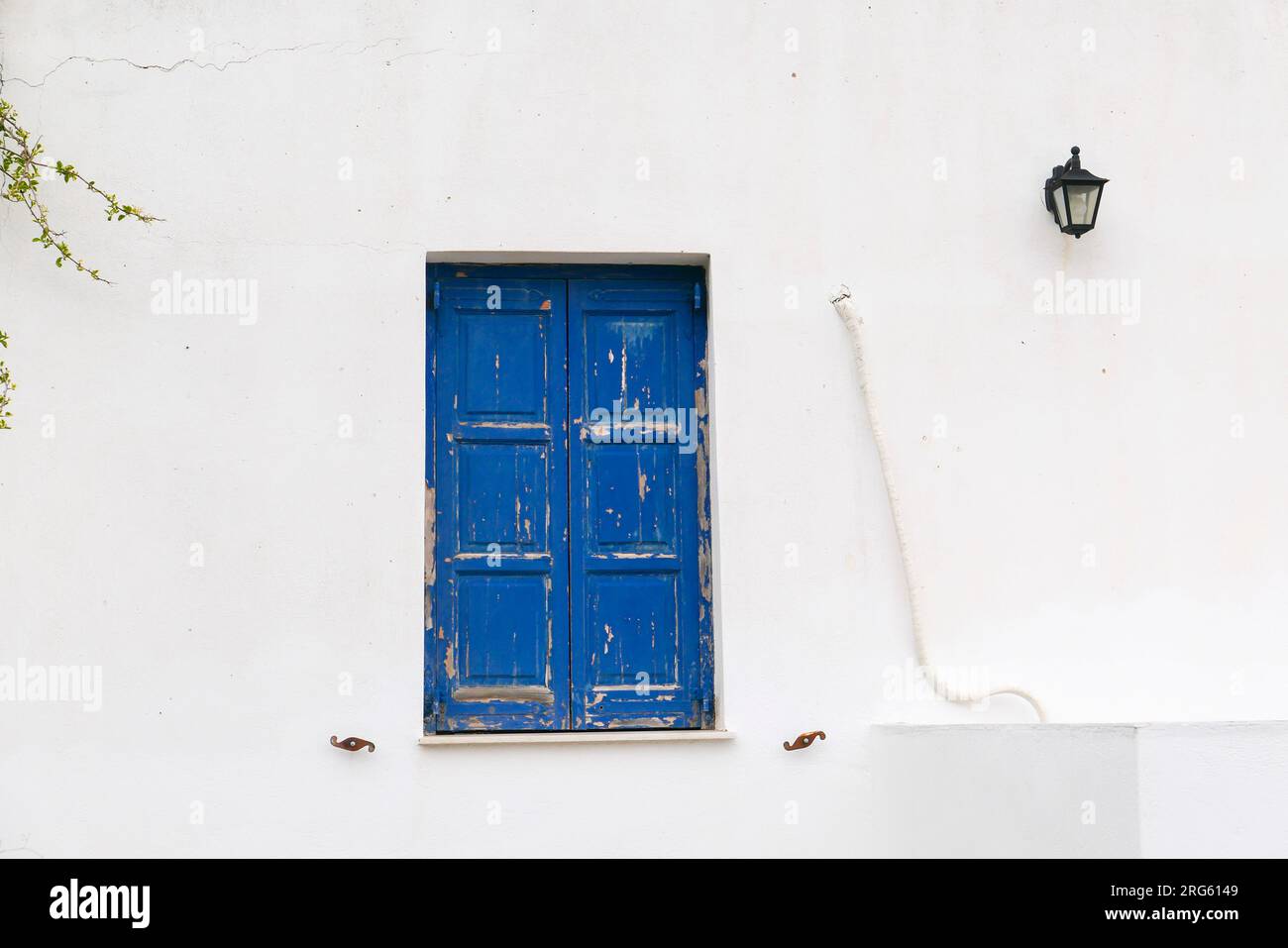 Blue Shuttered Window, Serifos, Greece Stock Photo