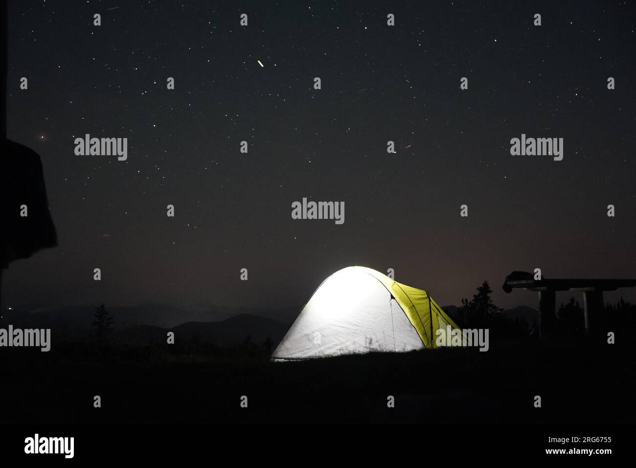 Camping on the top of a mountain, tent iluminated Stock Photo - Alamy
